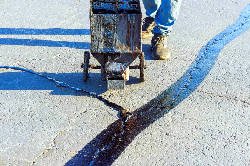 crack sealing vs overlaying