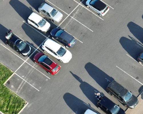 aerial-view-of-many-colorful-cars-parked-on-parkin-2024-12-07-02-19-03-utc aerial-view-of-many-colorful-cars-parked-on-parkin-2024-12-07-02-19-03-utc