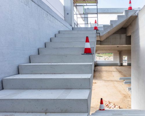 warehouse-stairs-construction-building-a-new-indu-2025-03-26-02-42-53-utc_7_11zon